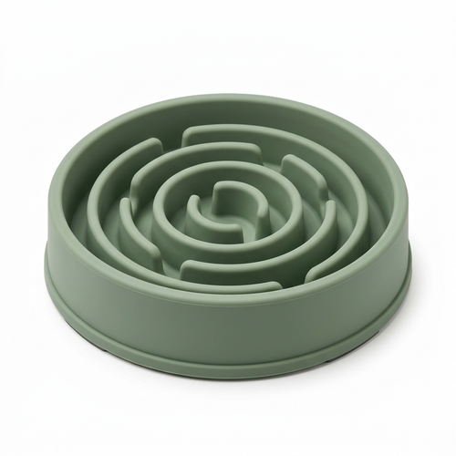 Sage green maze-style slow feeder dog bowl on a white background